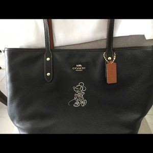 Coach Minnie Mouse city zip tote bag.